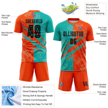 Charger l&#39;image dans la galerie, Custom Graffiti Pattern Black Aqua-Orange Scratch Sublimation Soccer Uniform Jersey
