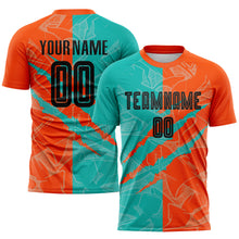 Charger l&#39;image dans la galerie, Custom Graffiti Pattern Black Aqua-Orange Scratch Sublimation Soccer Uniform Jersey
