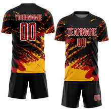 Load image into Gallery viewer, Custom Black Red-Gold Abstract Fragment Art Splash Sublimation Soccer Uniform Jersey
