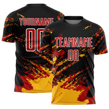 Load image into Gallery viewer, Custom Black Red-Gold Abstract Fragment Art Splash Sublimation Soccer Uniform Jersey
