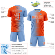 Laden Sie das Bild in den Galerie-Viewer, Custom Light Blue Orange-White Gradient Line Sublimation Soccer Uniform Jersey
