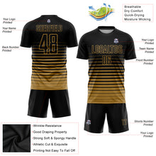 Laden Sie das Bild in den Galerie-Viewer, Custom Black Old Gold Pinstripe Fade Fashion Sublimation Soccer Uniform Jersey
